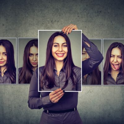 Masked,Woman,Expressing,Different,Emotions